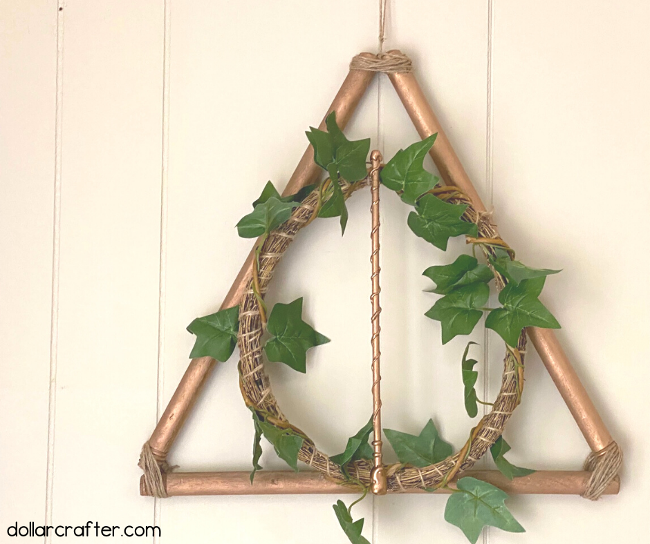 https://dollarcrafter.com/wp-content/uploads/2021/06/diy-harry-potter-deathly-hallows-wreath.png